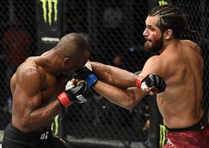 ABU DHABI, UNITED ARAB EMIRATES - JULY 12: In this handout image provided by UFC, (R-L) Jorge Masvidal punches Kamaru Usman of Nigeria in their UFC welterweight championship fight during the UFC 251 event at Flash Forum on UFC Fight Island on July 12, 2020 on Yas Island, Abu Dhabi, United Arab Emirates. (Photo by Jeff Bottari/Zuffa LLC via Getty Images)