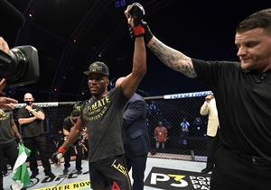 ABU DHABI, UNITED ARAB EMIRATES - JULY 12: In this handout image provided by UFC, Kamaru Usman of Nigeria celebrates after his victory over Jorge Masvidal in their UFC welterweight championship fight during the UFC 251 event at Flash Forum on UFC Fight Island on July 12, 2020 on Yas Island, Abu Dhabi, United Arab Emirates. (Photo by Jeff Bottari/Zuffa LLC via Getty Images)