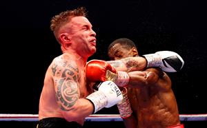 DUBAI, UNITED ARAB EMIRATES - APRIL 03: Jamel Herring (R) of the USA punches Carl Frampton of Northern Ireland during the WBO World Super Featherweight Title Fight between Jamel Herring and Carl Frampton at The Rotunda at Caesars Palace on April 03, 2021 in Dubai, United Arab Emirates. (Photo by Francois Nel/Getty Images)