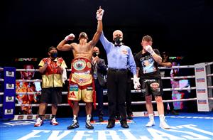 DUBAI, UNITED ARAB EMIRATES - APRIL 03: Jamel Herring of the USA celebrates victory as Carl Frampton of Northern Ireland reacts during the WBO World Super Featherweight Title Fight between Jamel Herring and Carl Frampton at The Rotunda at Caesars Palace on April 03, 2021 in Dubai, United Arab Emirates. (Photo by Francois Nel/Getty Images)