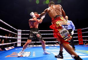 DUBAI, UNITED ARAB EMIRATES - APRIL 03: Jamel Herring (R) of the USA punches Carl Frampton of Northern Ireland during the WBO World Super Featherweight Title Fight between Jamel Herring and Carl Frampton at The Rotunda at Caesars Palace on April 03, 2021 in Dubai, United Arab Emirates. (Photo by Francois Nel/Getty Images)