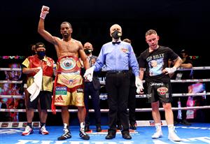 DUBAI, UNITED ARAB EMIRATES - APRIL 03: Jamel Herring of the USA celebrates victory as Carl Frampton of Northern Ireland reacts during the WBO World Super Featherweight Title Fight between Jamel Herring and Carl Frampton at The Rotunda at Caesars Palace on April 03, 2021 in Dubai, United Arab Emirates. (Photo by Francois Nel/Getty Images)