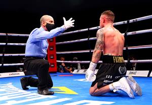 DUBAI, UNITED ARAB EMIRATES - APRIL 03: The referee counts down Carl Frampton of Northern Ireland after being knocked down during the WBO World Super Featherweight Title Fight between Jamel Herring and Carl Frampton at The Rotunda at Caesars Palace on April 03, 2021 in Dubai, United Arab Emirates. (Photo by Francois Nel/Getty Images)