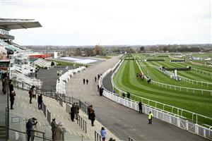 LIVERPOOL, ENGLAND - APRIL 08: Owners watch from their enclosure in the empty grandstands the Doom Bar Anniversary 4-Y-O Juvenile Hurdle during the Liverpool NHS Day of the 2021 Randox Health Grand National Festival at Aintree Racecourse on April 8, 2021 in Liverpool, England. (Photo by Tim Goode - Pool/Getty Images)