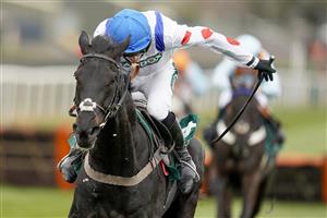 LIVERPOOL, ENGLAND - APRIL 08: Harry Cobden riding Monmiral clear the last to win The Doom Bar Anniversary 4-Y-O Juvenile Hurdle at Aintree Racecourse on April 08, 2021 in Liverpool, England. Sporting venues around the UK remain under restrictions due to the Coronavirus Pandemic. Only owners are allowed to attend the meeting but the public must wait until further restrictions are lifted. (Photo by Alan Crowhurst/Getty Images)