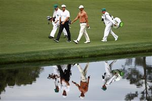 AUGUSTA, GEORGIA - APRIL 08: Bryson DeChambeau of the United States and Adam Scott of Australia walk totheduring the first round of the Masters at Augusta National Golf Club on April 08, 2021 in Augusta, Georgia. (Photo by Jared C. Tilton/Getty Images)