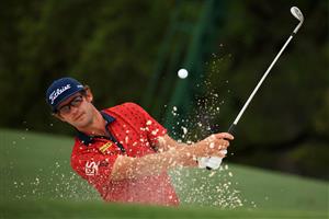 AUGUSTA, GEORGIA - APRIL 08: Lanto Griffin of the United States plays a shot from a bunker on the 18th hole during the first round of the Masters at Augusta National Golf Club on April 08, 2021 in Augusta, Georgia. (Photo by Mike Ehrmann/Getty Images)