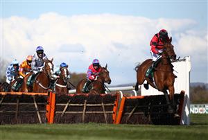 LIVERPOOL, ENGLAND - APRIL 09: Derek Fox riding Ahoy Senor (right) on their way to winning the Doom Bar Sefton Novices' Hurdle during Ladies Day of the 2021 Randox Health Grand National Festival at Aintree Racecourse on April 9, 2021 in Liverpool, England. (Photo by Tim Goode - Pool / Getty Images)