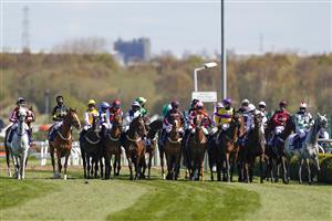 LIVERPOOL, ENGLAND - APRIL 09: A general view as runners gather for the start of The Pertemps Network Handicap Hurdle at Aintree Racecourse on April 09, 2021 in Liverpool, England. Sporting venues around the UK remain under restrictions due to the Coronavirus Pandemic. Only owners are allowed to attend the meeting but the public must wait until further restrictions are lifted. (Photo by Alan Crowhurst/Getty Images)