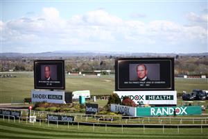 LIVERPOOL, ENGLAND - APRIL 09: Tributes on big screens for the late Prince Philip, Duke of Edinburgh, ahead of Ladies Day of the 2021 Randox Health Grand National Festival at Aintree Racecourse on April 9, 2021 in Liverpool, England. (Photo by Tim Goode - Pool / Getty Images)