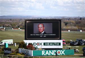 LIVERPOOL, ENGLAND - APRIL 09: A tribute on a big screen for the late Prince Philip, Duke of Edinburgh, ahead of Ladies Day of the 2021 Randox Health Grand National Festival at Aintree Racecourse on April 9, 2021 in Liverpool, England. (Photo by Tim Goode - Pool / Getty Images)