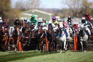 LIVERPOOL, ENGLAND - APRIL 09: Runners and riders in the Pertemps Network Handicap Hurdle during Ladies Day of the 2021 Randox Health Grand National Festival at Aintree Racecourse on April 9, 2021 in Liverpool, England. (Photo by Tim Goode - Pool / Getty Images)
