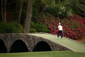 AUGUSTA, GEORGIA - APRIL 08: Sungjae Im of Korea walks over the Hogan Bridge on the 12th hole during the first round of the Masters at Augusta National Golf Club on April 08, 2021 in Augusta, Georgia. (Photo by Jared C. Tilton/Getty Images)