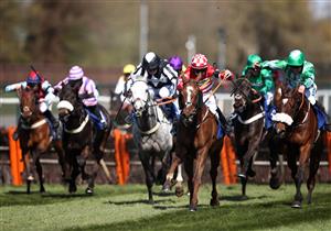 LIVERPOOL, ENGLAND - APRIL 09: Jack Kennedy riding Tronador (centre right) on their way to winning the Pertemps Network Handicap Hurdle during Ladies Day of the 2021 Randox Health Grand National Festival at Aintree Racecourse on April 9, 2021 in Liverpool, England. (Photo by Tim Goode - Pool / Getty Images)