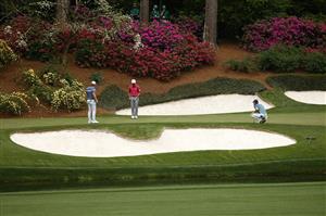 AUGUSTA, GEORGIA - APRIL 08: Cameron Smith of Australia, Collin Morikawa of the United States and Jordan Spieth of the United States look over their putts on the 15th green during the first round of the Masters at Augusta National Golf Club on April 08, 2021 in Augusta, Georgia. (Photo by Jared C. Tilton/Getty Images)