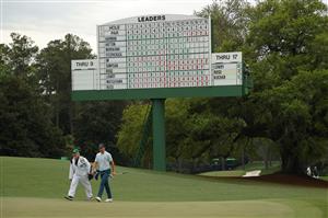AUGUSTA, GEORGIA - APRIL 08: Justin Rose of England and his caddie, David Clark, walk to the 18th green during the first round of the Masters at Augusta National Golf Club on April 08, 2021 in Augusta, Georgia. (Photo by Kevin C. Cox/Getty Images)