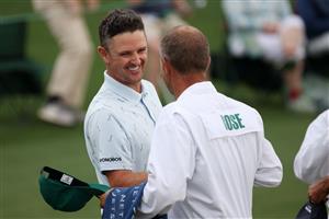AUGUSTA, GEORGIA - APRIL 08: Justin Rose of England fist bumps his caddie, David Clark, after his round on the 18th green during the first round of the Masters at Augusta National Golf Club on April 08, 2021 in Augusta, Georgia. (Photo by Kevin C. Cox/Getty Images)