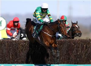 LIVERPOOL, ENGLAND - APRIL 09: Mark Walsh riding Fakir D'oudairies on their way to winning the Marsh Chase during Ladies Day of the 2021 Randox Health Grand National Festival at Aintree Racecourse on April 9, 2021 in Liverpool, England. (Photo by Tim Goode - Pool / Getty Images)