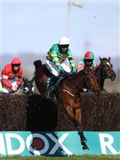 LIVERPOOL, ENGLAND - APRIL 09: Mark Walsh riding Fakir D'oudairies on their way to winning the Marsh Chase during Ladies Day of the 2021 Randox Health Grand National Festival at Aintree Racecourse on April 9, 2021 in Liverpool, England. (Photo by Tim Goode - Pool / Getty Images)