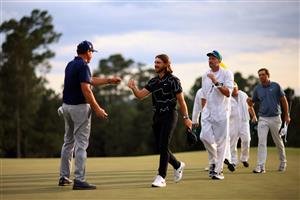 AUGUSTA, GEORGIA - APRIL 08: Phil Mickelson of the United States fist bumps Tommy Fleetwood of England on the 18th green during the first round of the Masters at Augusta National Golf Club on April 08, 2021 in Augusta, Georgia. (Photo by Mike Ehrmann/Getty Images)