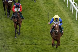 LIVERPOOL, ENGLAND - APRIL 10: Ciaran Gethings riding Hometown Boy win The EFT Systems Handicap Hurdle at Aintree Racecourse on April 10, 2021 in Liverpool, England. Sporting venues around the UK remain under restrictions due to the Coronavirus Pandemic. Only owners are allowed to attend the meeting but the public must wait until further restrictions are lifted. (Photo by Alan Crowhurst/Getty Images) (Photo by Alan Crowhurst/Getty Images)