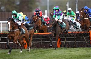 LIVERPOOL, ENGLAND - APRIL 10: Runners and riders on the fist lap during the EFT Systems Handicap Hurdle during Grand National Day of the 2021 Randox Health Grand National Festival at Aintree Racecourse on April 10, 2021 in Liverpool, England. (Photo by Tim Goode - Pool / Getty Images)