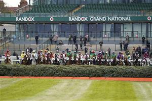 LIVERPOOL, ENGLAND - APRIL 10: A general view as runners prepare for the start of The Randox Grand National Handicap Chase at Aintree Racecourse on April 10, 2021 in Liverpool, England. Sporting venues around the UK remain under restrictions due to the Coronavirus Pandemic. Only owners are allowed to attend the meeting but the public must wait until further restrictions are lifted. (Photo by Alan Crowhurst/Getty Images)