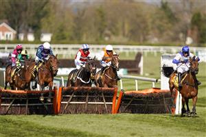 LIVERPOOL, ENGLAND - APRIL 10: Tom O'Brien riding Thyme Hill (L, purple/green) clear the last to win The Ryanair Stayers Hurdle from Harry Skelton and Roksana (R) at Aintree Racecourse on April 10, 2021 in Liverpool, England. Sporting venues around the UK remain under restrictions due to the Coronavirus Pandemic. Only owners are allowed to attend the meeting but the public must wait until further restrictions are lifted. (Photo by Alan Crowhurst/Getty Images)