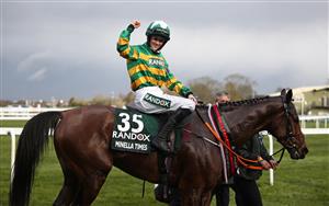 LIVERPOOL, ENGLAND - APRIL 10: Rachael Blackmore celebrates winning on Minella Times the Randox Grand National Handicap Chase on Grand National Day of the 2021 Randox Health Grand National Festival at Aintree Racecourse on April 10, 2021 in Liverpool, England. (Photo by Tim Goode - Pool/Getty Images)