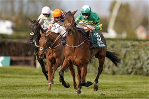 LIVERPOOL, ENGLAND - APRIL 10: Rachael Blackmore riding Minella Times (R) clear the last to win The Randox Grand National Handicap Chase at Aintree Racecourse on April 10, 2021 in Liverpool, England. Sporting venues around the UK remain under restrictions due to the Coronavirus Pandemic. Only owners are allowed to attend the meeting but the public must wait until further restrictions are lifted. (Photo by Alan Crowhurst/Getty Images)