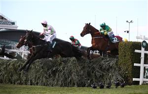 LIVERPOOL, ENGLAND - APRIL 10: Minella Times ridden by Rachael Blackmore (right) clear The Chair before winning the Randox Grand National Handicap Chase during Grand National Day of the 2021 Randox Health Grand National Festival at Aintree Racecourse, on April 10, 2021 in Liverpool, England. (Photo by Tim Goode - Pool/Getty Images)