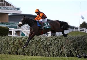 LIVERPOOL, ENGLAND - APRIL 10: Jett ridden by Sam Waley-Cohen clears The Chair during the Grand National on Grand National Day of the 2021 Randox Health Grand National Festival at Aintree Racecourse on April 10, 2021 in Liverpool, England. (Photo by Tim Goode - Pool/Getty Images)