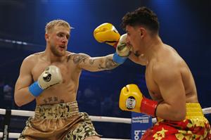 MIAMI, FLORIDA - JANUARY 30: Jake Paul punches AnEsonGib during their fight at Meridian at Island Gardens on January 30, 2020 in Miami, Florida. (Photo by Michael Reaves/Getty Images)