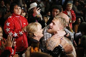 MIAMI, FLORIDA - JANUARY 30: Jake Paul celebrates with his family after defeating AnEsonGib in a first round knockout during their fight at Meridian at Island Gardens on January 30, 2020 in Miami, Florida. (Photo by Michael Reaves/Getty Images)