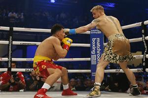 MIAMI, FLORIDA - JANUARY 30: Jake Paul punches AnEsonGib during their fight at Meridian at Island Gardens on January 30, 2020 in Miami, Florida. (Photo by Michael Reaves/Getty Images)