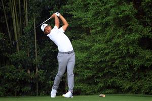 AUGUSTA, GEORGIA - APRIL 11: Xander Schauffele of the United States plays his shot from the 14th tee during the final round of the Masters at Augusta National Golf Club on April 11, 2021 in Augusta, Georgia. (Photo by Mike Ehrmann/Getty Images)