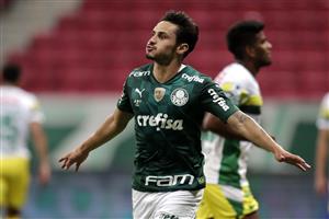 BRASILIA, BRAZIL - APRIL 14: Raphael Veiga of Palmeiras celebrates after scoring the first goal of his team via penalty during a match between Palmeiras and Defensa y Justicia as part of the second leg of the Conmebol Recopa at Mane Garrincha Stadium on April 14, 2021 in Brasilia, Brazil. (Photo by Ueslei Marcelino-Pool/Getty Images)