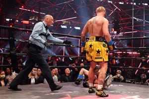 ATLANTA, GEORGIA - APRIL 17: Jake Paul knocks down Ben Askren in their cruiserweight bout during Triller Fight Club at Mercedes-Benz Stadium on April 17, 2021 in Atlanta, Georgia. (Getty Images)