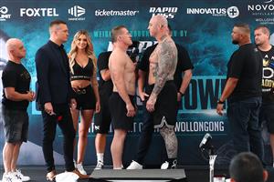 WOLLONGONG, AUSTRALIA - APRIL 20: Paul Gallen and Lucas Browne face off during the weigh in ahead of their bout at Novotel Wollongong Northbeach on April 20, 2021 in Wollongong, Australia. (Getty Images)