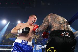 WOLLONGONG, AUSTRALIA - APRIL 21: Paul Gallen punches Lucas Browne during their bout at WIN Entertainment Centre on April 21, 2021 in Wollongong, Australia. (Getty Images)