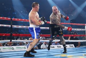 WOLLONGONG, AUSTRALIA - APRIL 21: Lucas Browne swings at Paul Gallen during their bout at WIN Entertainment Centre on April 21, 2021 in Wollongong, Australia. (Getty Images)