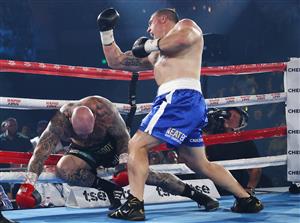 WOLLONGONG, AUSTRALIA - APRIL 21: Paul Gallen punches Lucas Browne during their bout at WIN Entertainment Centre on April 21, 2021 in Wollongong, Australia. (Getty Images)