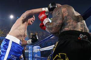 WOLLONGONG, AUSTRALIA - APRIL 21: Paul Gallen punches Lucas Browne during their bout at WIN Entertainment Centre on April 21, 2021 in Wollongong, Australia. (Getty Images)