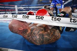 WOLLONGONG, AUSTRALIA - APRIL 21: Lucas Browne lays on the floor after being knocked down by Paul Gallen during their bout at WIN Entertainment Centre on April 21, 2021 in Wollongong, Australia. (Getty Images)