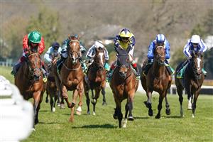 ESHER, ENGLAND - APRIL 23: Frankie Dettori riding Waldkonig (red) win The bet365 Gordon Richards Stakes at Sandown Park Racecourse on April 23, 2021 in Esher, England. Sporting venues around the UK remain under restrictions due to the Coronavirus Pandemic. Only owners are allowed to attend the meeting but the public must wait until further restrictions are lifted. (Photo by Alan Crowhurst/Getty Images)