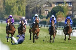 ESHER, ENGLAND - APRIL 23: Ryan Moore falls from Rifleman after it
veers when making its challenge inside the final furlong during The bet365 Esher Cup Handicap at Sandown Park Racecourse on April 23, 2021 in Esher, England. Sporting venues around the UK remain under restrictions due to the Coronavirus Pandemic. Only owners are allowed to attend the meeting but the public must wait until further restrictions are lifted. (Photo by Alan Crowhurst/Getty Images)