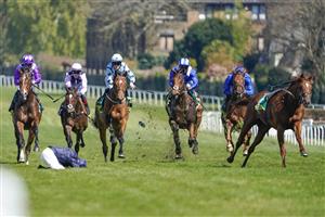 ESHER, ENGLAND - APRIL 23: Ryan Moore falls from Rifleman after it
veers when making its challenge inside the final furlong during The bet365 Esher Cup Handicap at Sandown Park Racecourse on April 23, 2021 in Esher, England. Sporting venues around the UK remain under restrictions due to the Coronavirus Pandemic. Only owners are allowed to attend the meeting but the public must wait until further restrictions are lifted. (Photo by Alan Crowhurst/Getty Images)