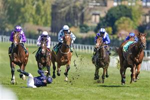 ESHER, ENGLAND - APRIL 23: Ryan Moore falls from Rifleman after it
veers when making its challenge inside the final furlong during The bet365 Esher Cup Handicap at Sandown Park Racecourse on April 23, 2021 in Esher, England. Sporting venues around the UK remain under restrictions due to the Coronavirus Pandemic. Only owners are allowed to attend the meeting but the public must wait until further restrictions are lifted. (Photo by Alan Crowhurst/Getty Images)