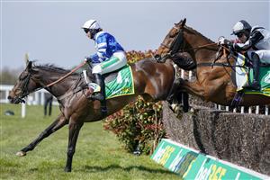 ESHER, ENGLAND - APRIL 24: Bryony Frost riding Frodon (L) clear the ditch on their way to winning The bet365 Oaksey Chase at Sandown Park Racecourse on April 24, 2021 in Esher, England. Sporting venues around the UK remain under restrictions due to the Coronavirus Pandemic. Only owners are allowed to attend the meeting but the public must wait until further restrictions are lifted. (Photo by Alan Crowhurst/Getty Images)