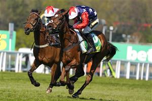 ESHER, ENGLAND - APRIL 24: Tom Cannon riding Potterman (L) win The bet365 Gold Cup Handicap Chase in the stewards room after first past the post Harry Skelton riding Enrilo (not shown) are placed third behind Potterman and the Jack Tudor ridden Kitty's Light (R) at Sandown Park Racecourse on April 24, 2021 in Esher, England. Sporting venues around the UK remain under restrictions due to the Coronavirus Pandemic. Only owners are allowed to attend the meeting but the public must wait until further restrictions are lifted. (Photo by Alan Crowhurst/Getty Images)